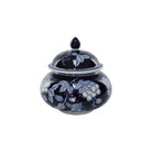 Ceramic jar with blue floral pattern and lid