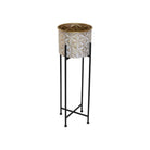 Decorative white & gold planter with geometric pattern on a black metal stand