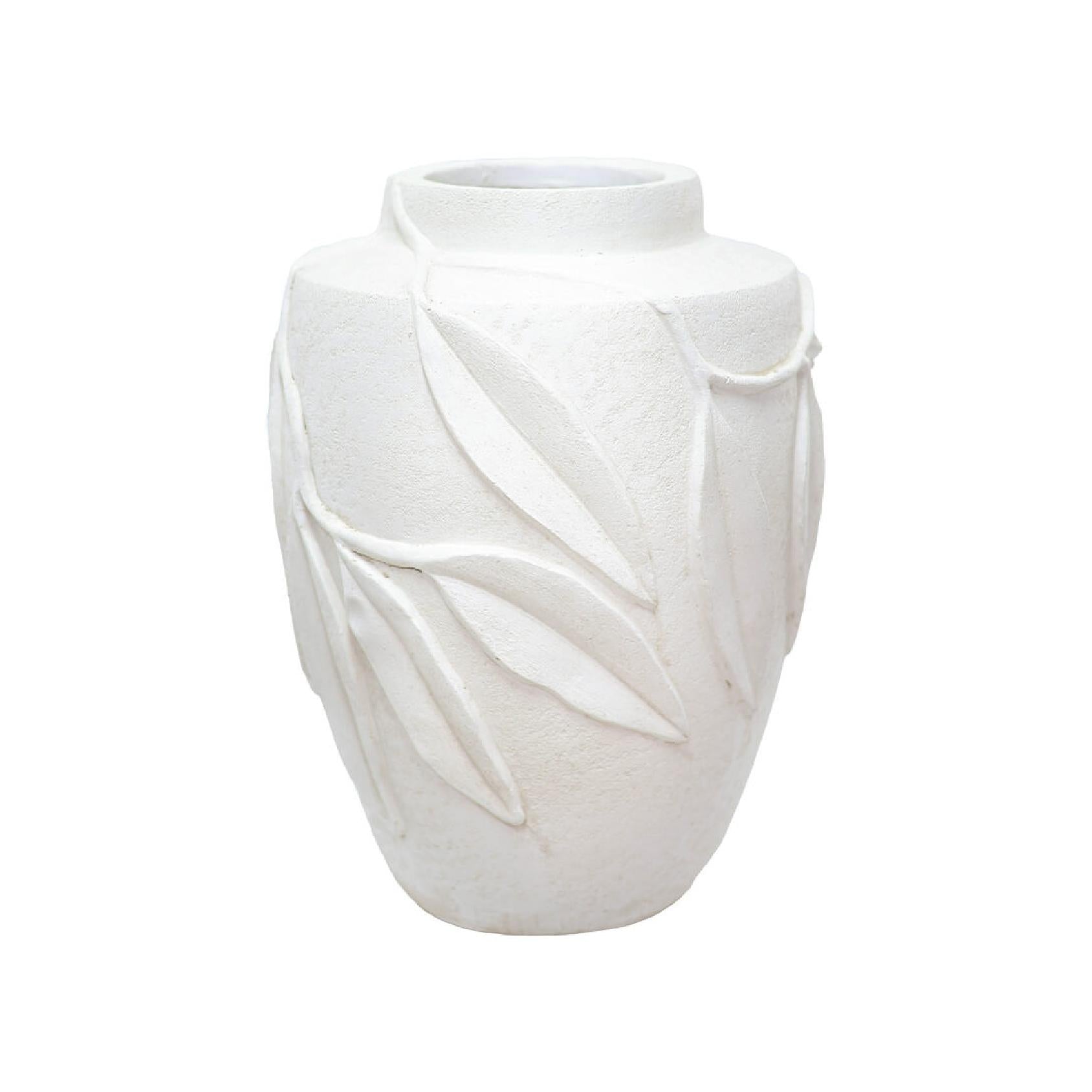 White ceramic vase with a leaf-like design