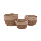 Three woven decorative baskets of different sizes
