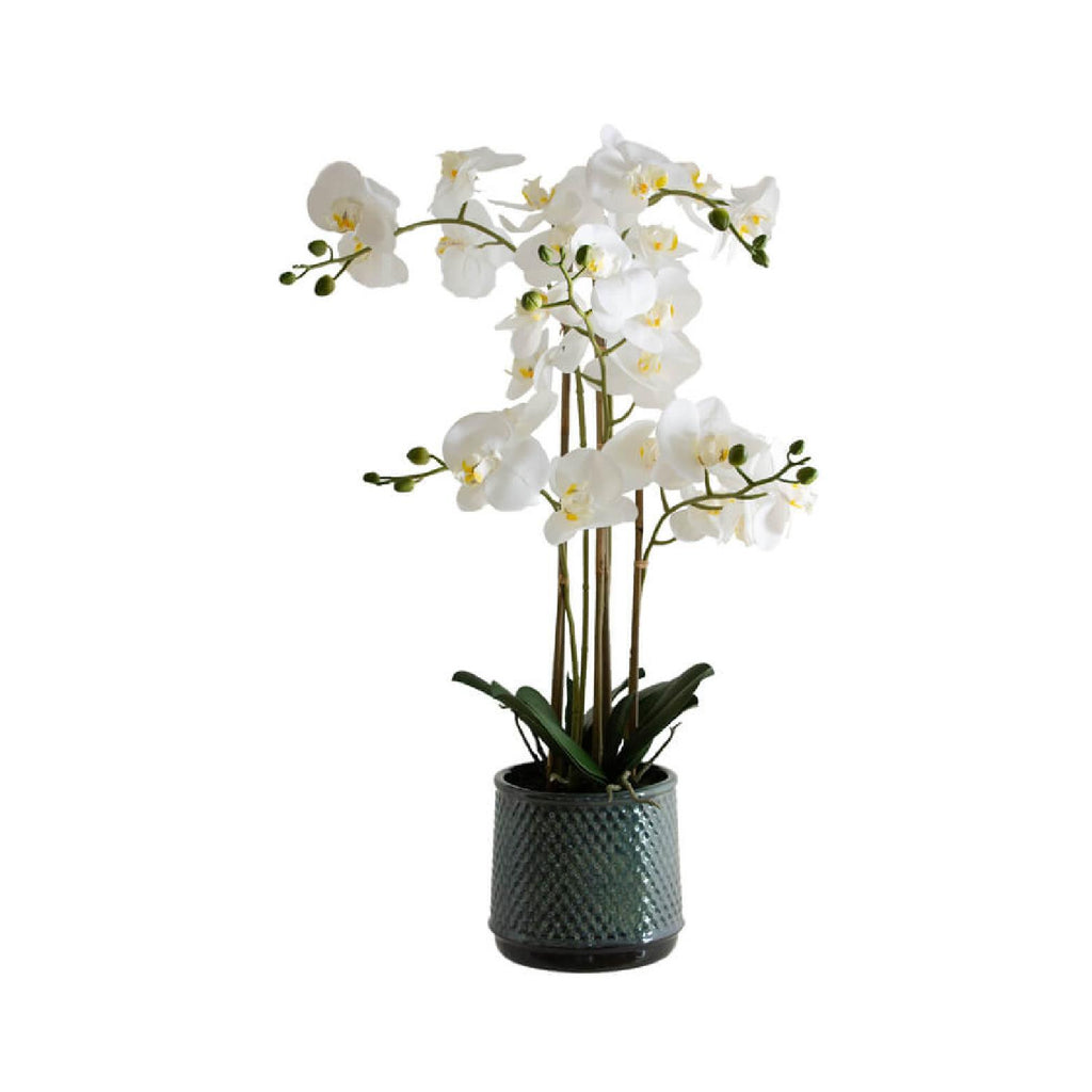 Artificial white orchid in grey pot