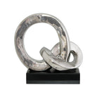 Silver decorative rings on a black base