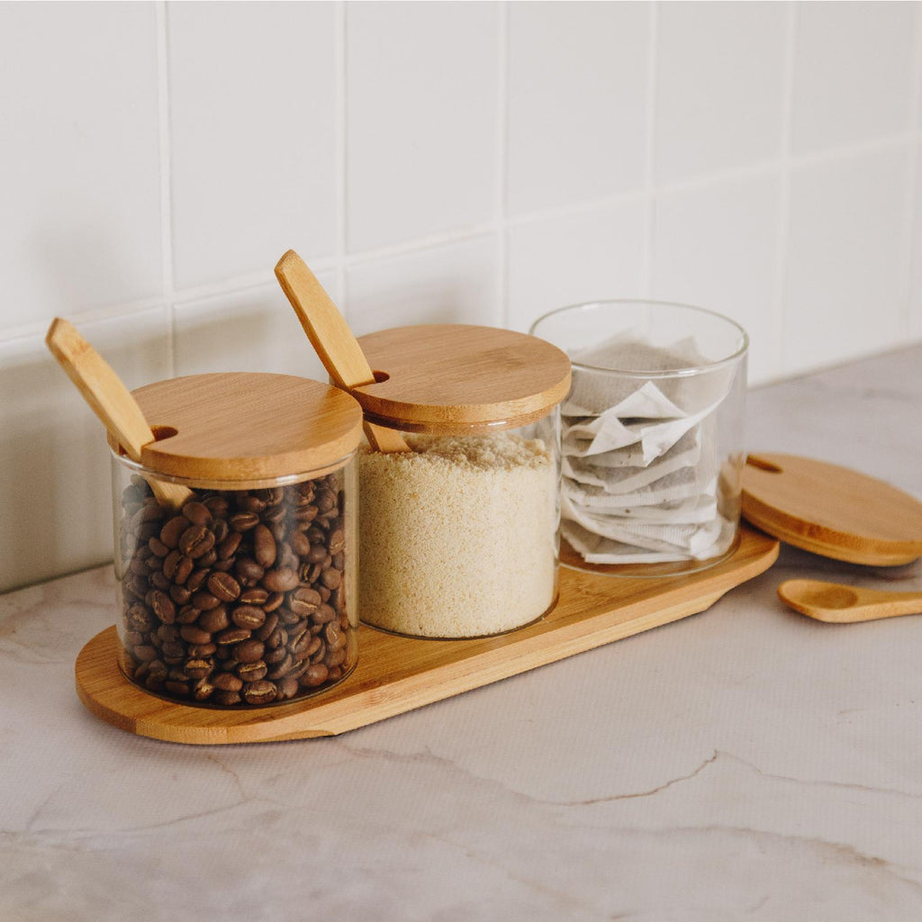 Glass storage set with bamboo display tray and lids and spoons